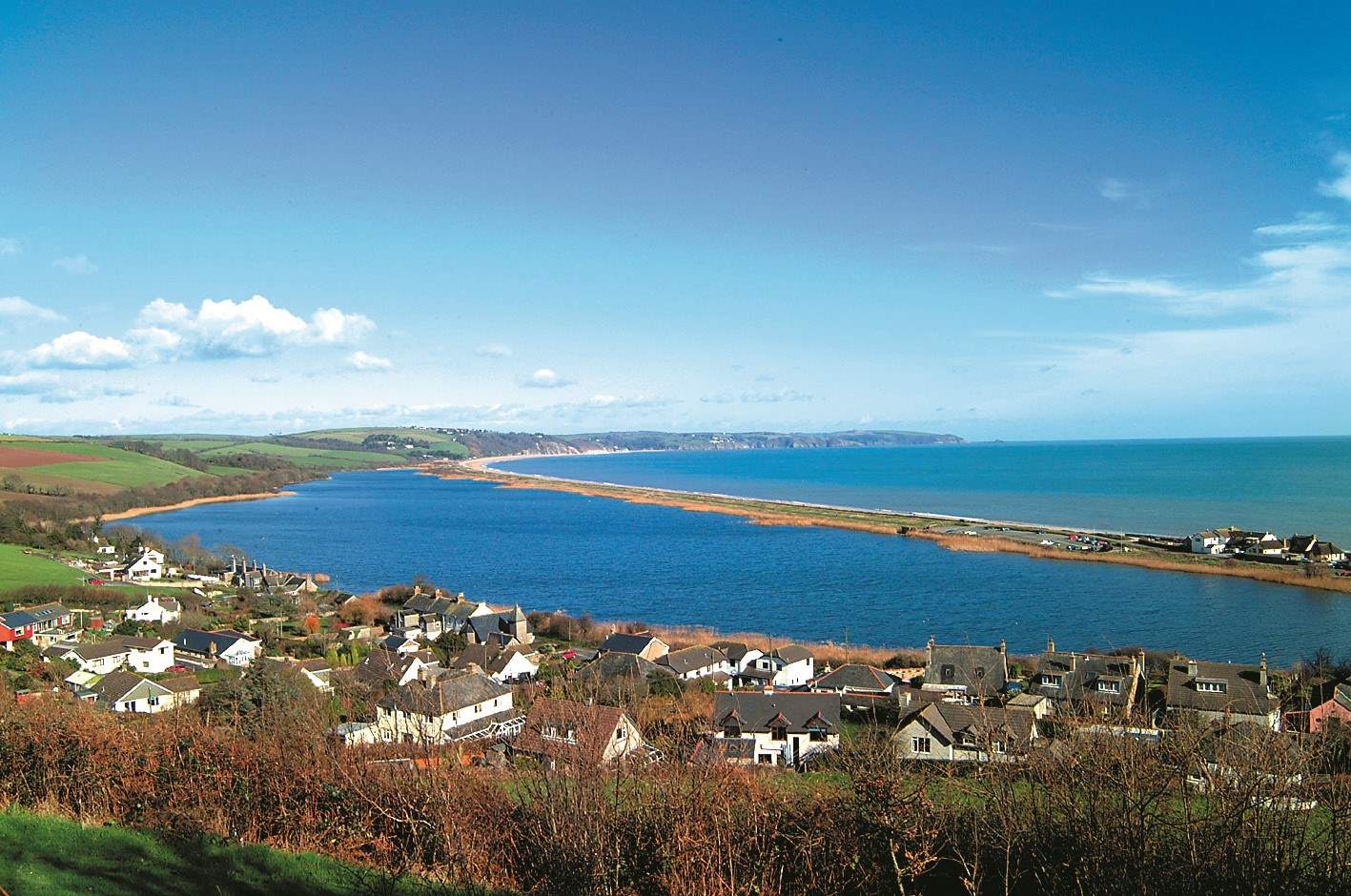 Looking across to Slapton Ley and Slapton Sands. Slapton Ley is a Site of Special Scientific Interest and a National Nature Reserve in Devon.