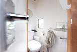 The toilet is tucked away within the horse box, so there's no need to put on your wellies in the night! 