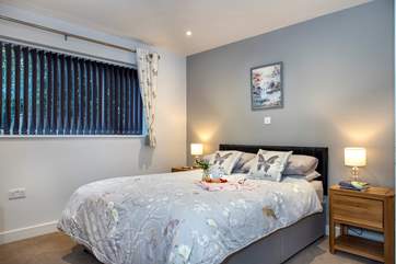 The bedroom with king-size bed.