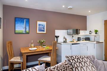 The open plan kitchen and dining area.