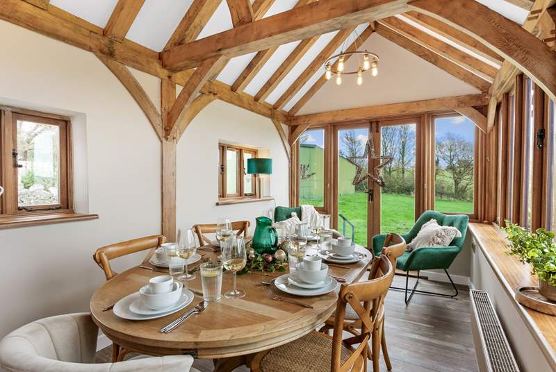 The gorgeous dining-area has views out over the surrounding countryside.