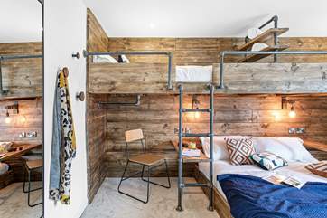 Bedroom one is on the ground floor and is a family suite with an en suite shower-room.