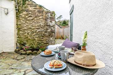 The pretty courtyard is the perfect place to sit and enjoy the outdoors.