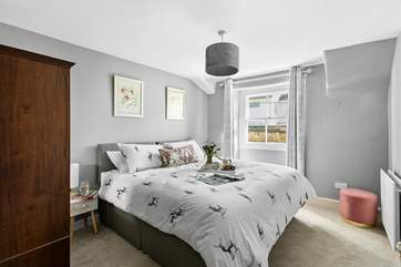Bedroom 1 is oh so pretty and can be made up as a super-king bed or twins for flexibility.