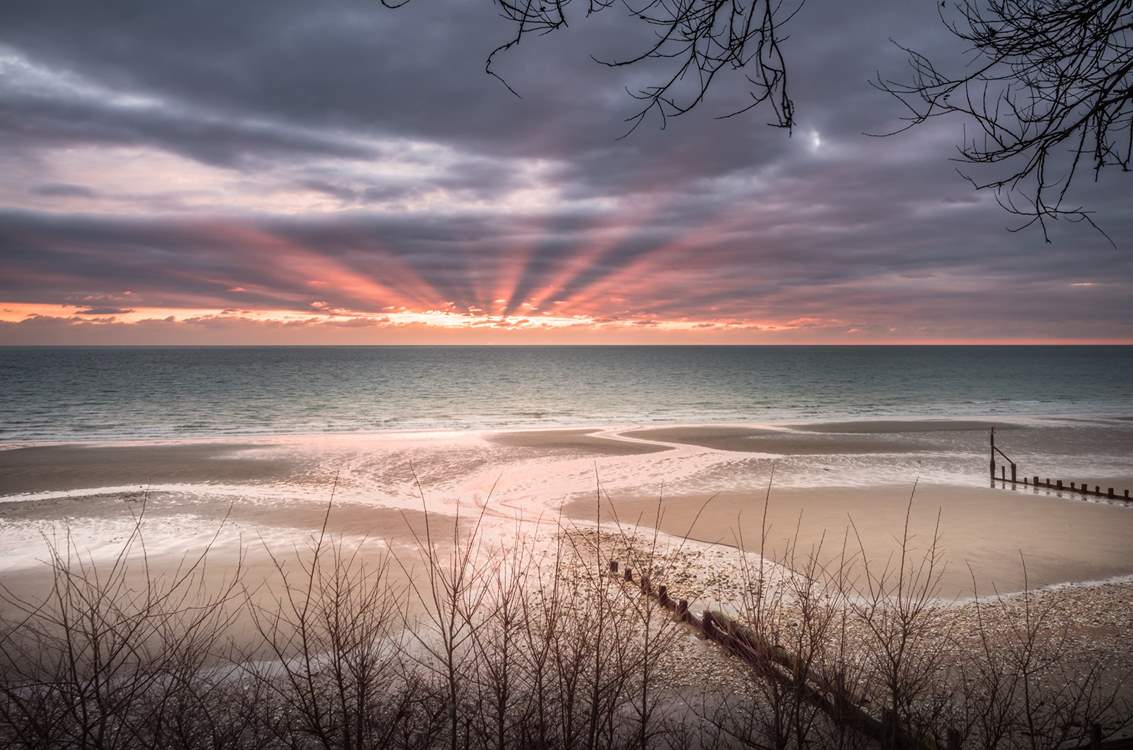 Wake up early to watch the sun rise overlooking Shanklin beach.