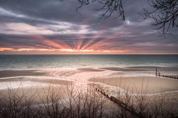 Wake up early to watch the sun rise overlooking Shanklin beach.
