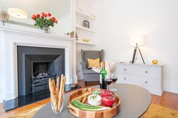 Wine and dine in front of the cosy, and very realistic, gas fire.