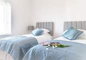 Oh so pretty, the twin-room is decorated in lovely pastel shades.