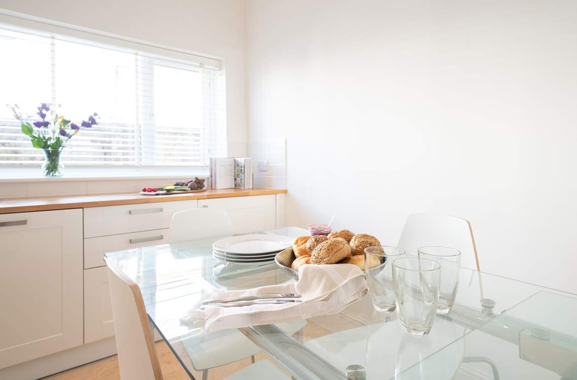 There is plenty of work space in the kitchen, perfect for preparing meals for family or friends.
