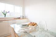 There is plenty of work space in the kitchen, perfect for preparing meals for family or friends.