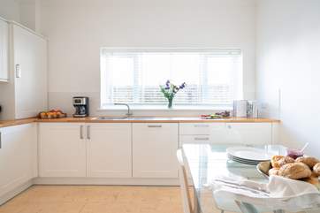 Cook up a family favourite in the stylish modern kitchen.