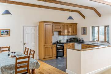 The open plan living space is the perfect place to spend quality time together.