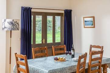 Perhaps open the doors by the dining-table and listen to the birdsong.