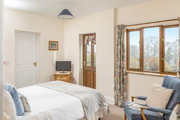 The main bedroom has lovely views over the fields.