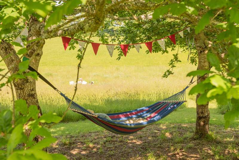 Spend lazy afternoons in the hammock.