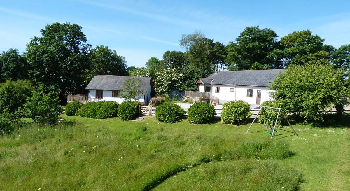 Bramley Cottage is the property on the left, enjoy playing in the meadow or swing set which is shared with Orchard Cottage. 