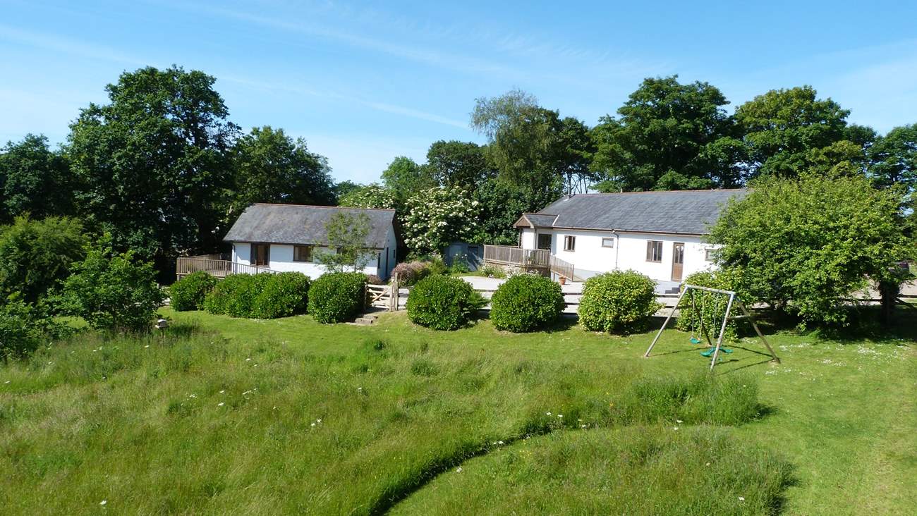 Bramley Cottage is the property on the left, enjoy playing in the meadow or swing set which is shared with Orchard Cottage.