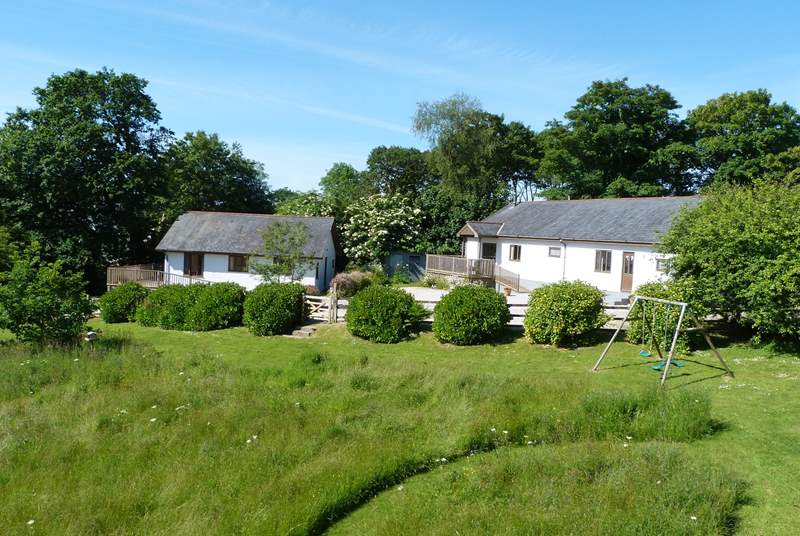 Bramley Cottage is the property on the left, enjoy playing in the meadow or swing set which is shared with Orchard Cottage. 