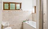 The family bathroom has a large bath for two and a separate shower.  - Thumbnail Image