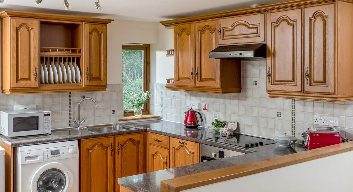 The farmhouse kitchen is very well-equipped. 