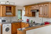 The farmhouse kitchen is very well-equipped.