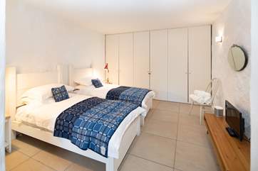 The second twin bedroom near the single room and family bathroom.