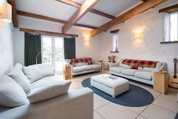 This beautifully restored barn has exposed beams, stonework and a warming wood-burner to keep you toasty at any time of year.