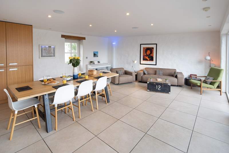 A separate sitting-area adjoins the kitchen/diner making this a super sociable space.