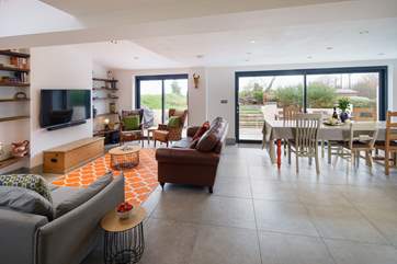 Open up the sliding doors on a beautiful day to make the most of the space.