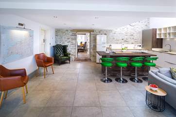 The snug leads off from the open plan kitchen.