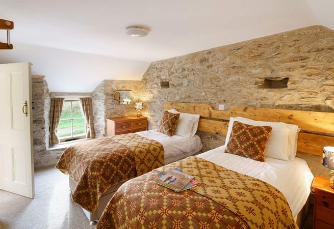 On the first floor is bedroom two, a lovely twin room with gorgeous Welsh furnishings. 