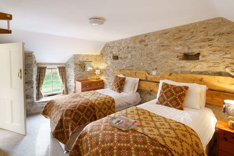 On the first floor is bedroom two, a lovely twin room with gorgeous Welsh furnishings. 