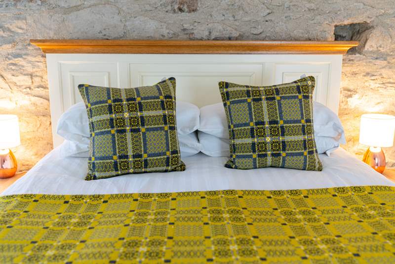 Quality Melin Tregwynt cushions and throws throughout. 