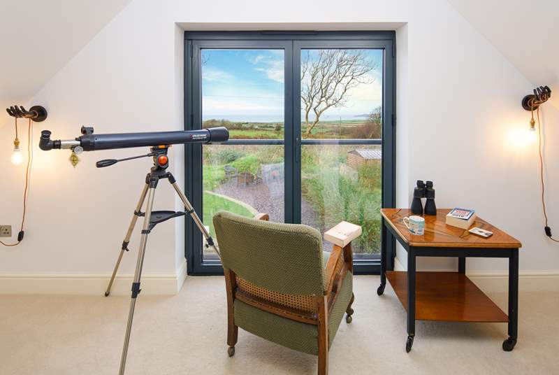Relax in the  reading-room looking out over the countryside towards the turquoise sea and dramatic coast beyond. 