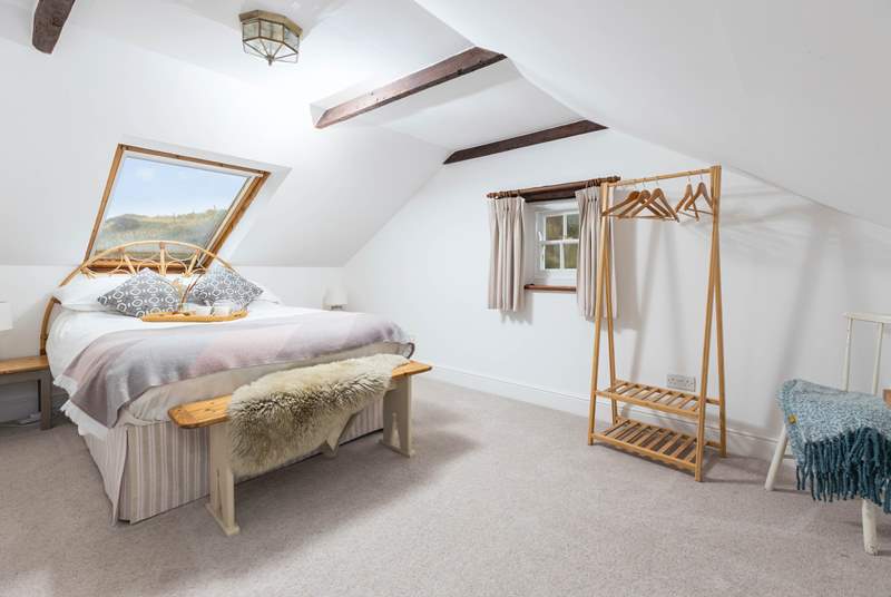The main bedroom is light and spacious, with the added benefit of an en suite shower-room.