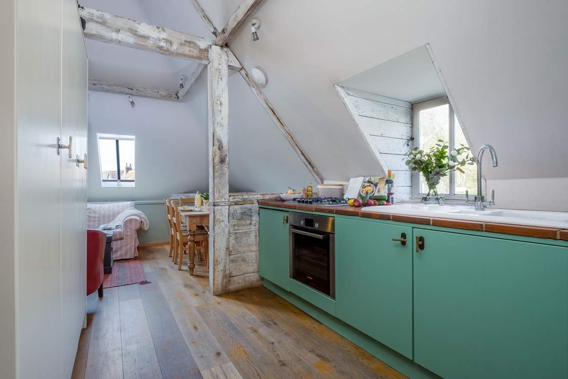 The kitchen is a great space to cook your favourite holiday meals whilst still chatting to family and friends in the open plan living area.