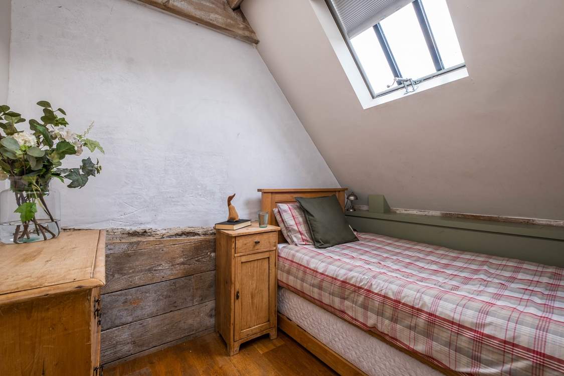 There is a single bed with trundle single that can be made into a twin  room.