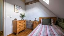 Another view of the single room with lovely antique furniture.