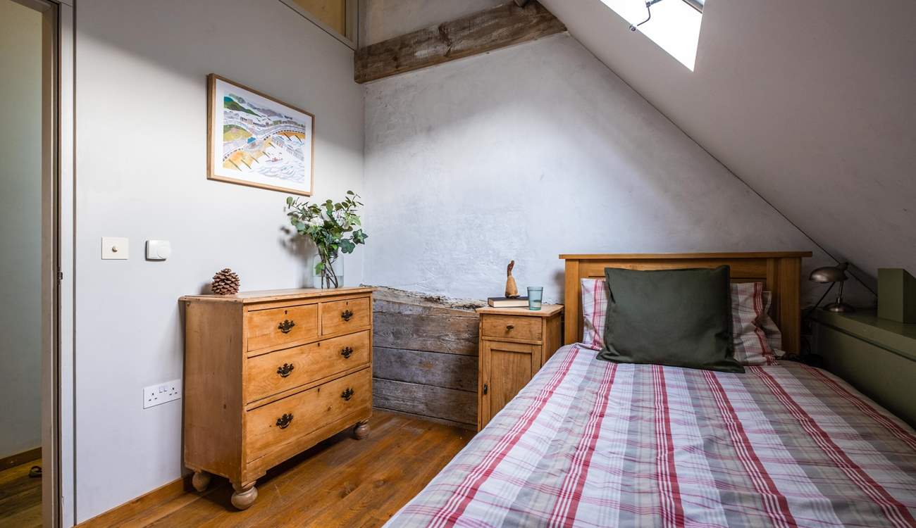 Another view of the single room with lovely antique furniture.