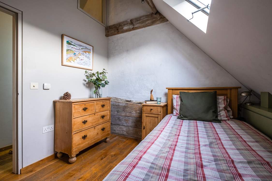 Another view of the single room with lovely antique furniture.