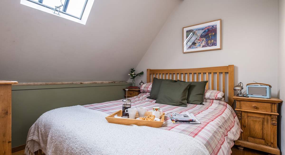 The main bedroom with a comfortable king-size double bed.