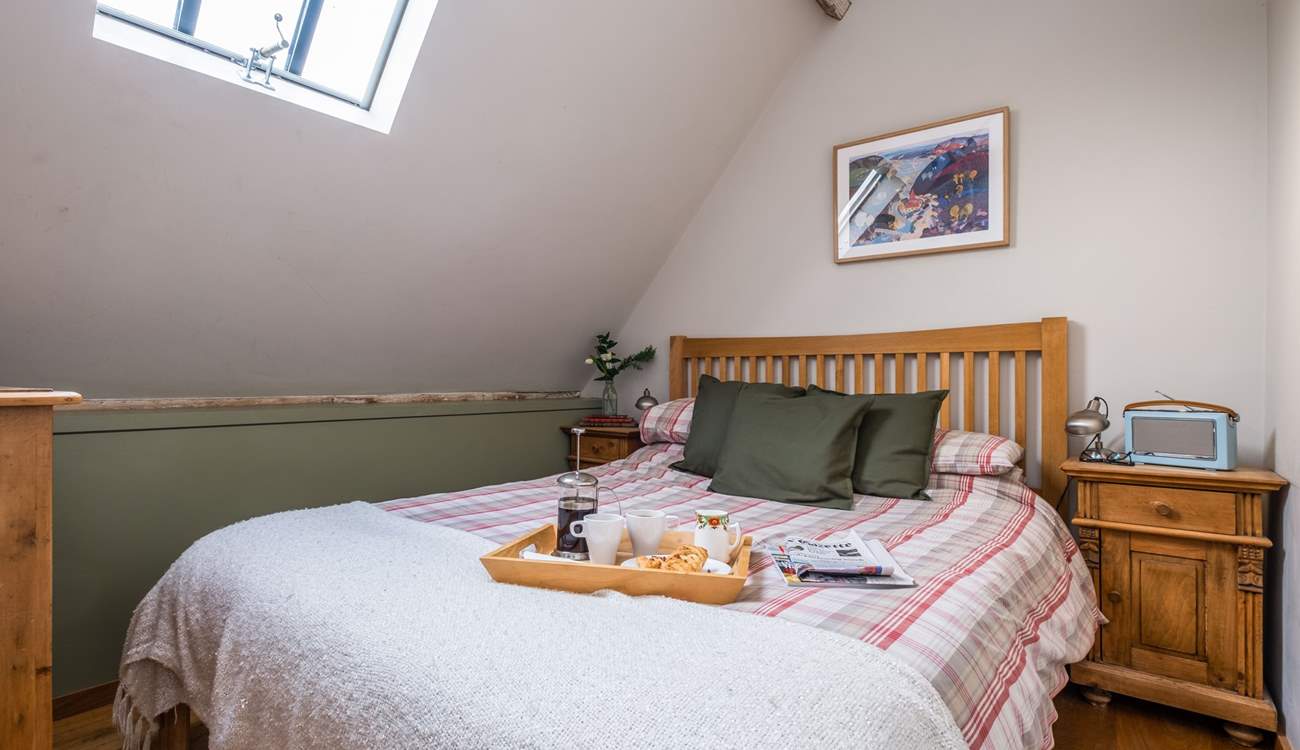 The main bedroom with a comfortable king-size double bed.