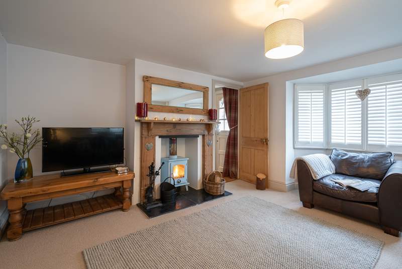 The gorgeous sitting-room, the perfect place to relax in front of the wood-burner.
