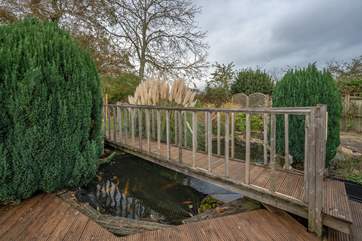 Please take care on the decking when wet and be aware of the pond and supervise children at all times.