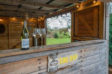 How cool is this? Serve up a drink of choice in the Tiki Bar!