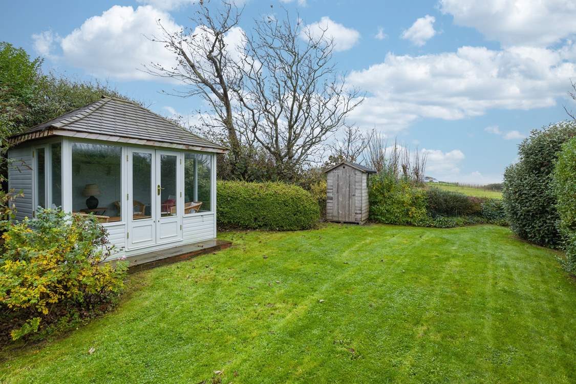 The super garden-room, the perfect spot for a quiet read.