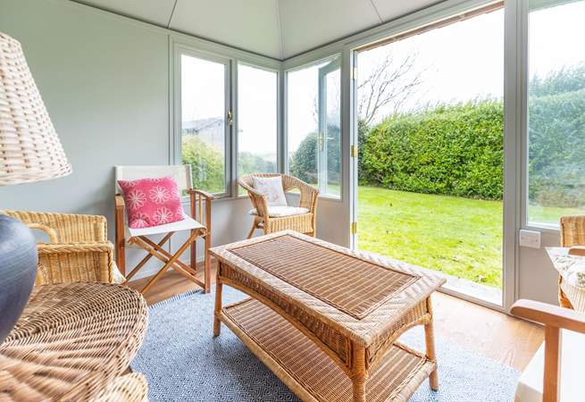 Sit and relax in the separate garden-room.