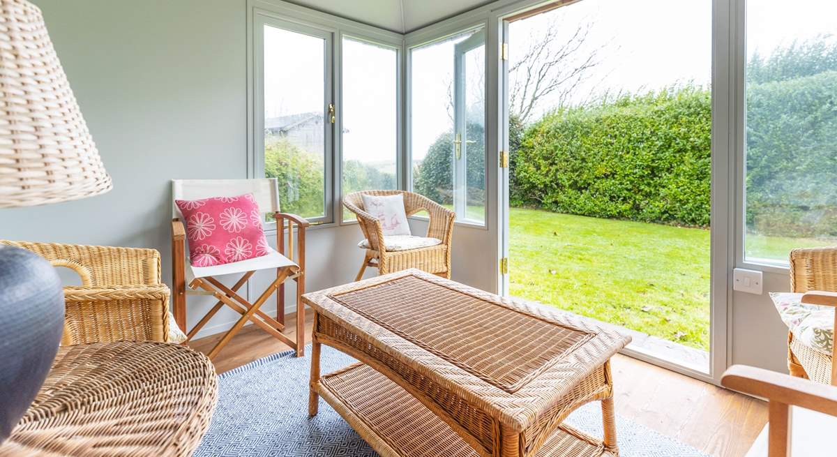 Sit and relax in the separate garden-room.