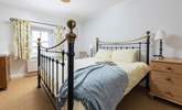 The main bedroom has a fabulous super-king size bed and a lovely brass bedstead.  - Thumbnail Image