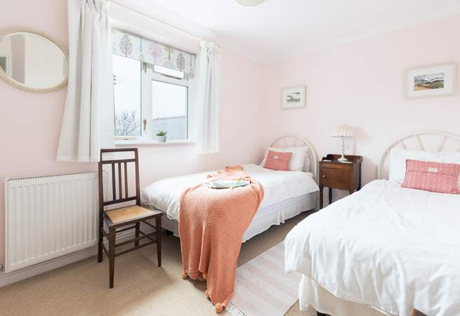 The lovely twin bedroom is suitable for either children or adults. 